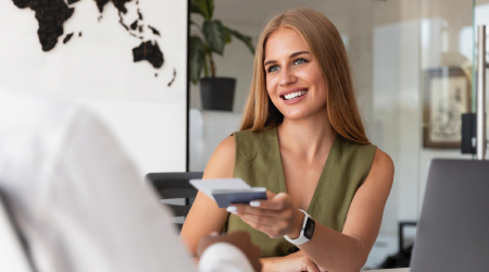 A girl talking to a man in office showing personal assistance